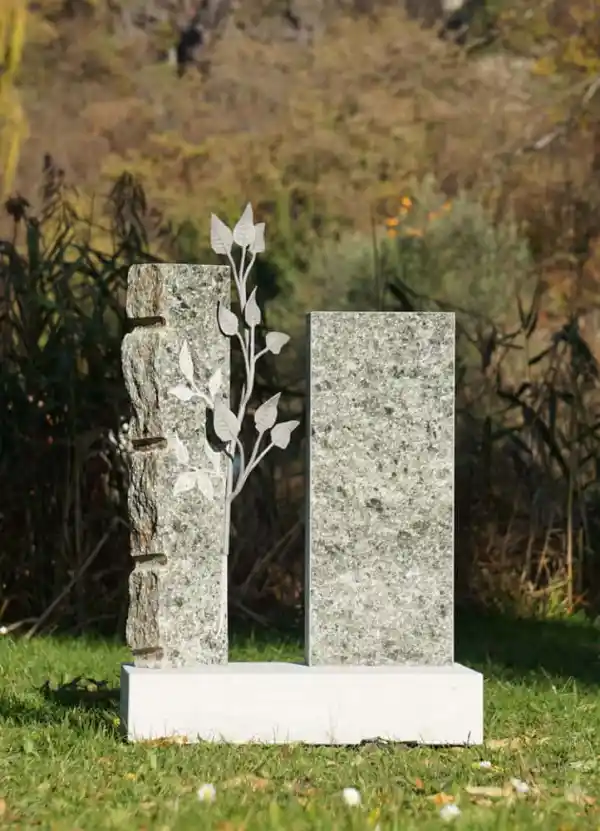 Rinascità - Pietra tombale con ramo e foglie